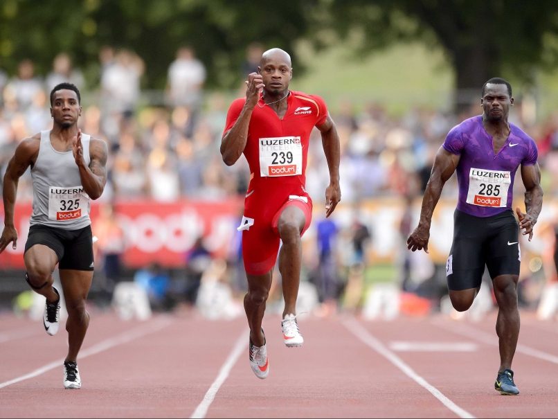 Asafa Powell (Tiyongtsü), Nesta Carter (Achiji) aser Kemar Bailey-Cole nungeri tebur 100m final nung toktepa asemba noksa nung angur.